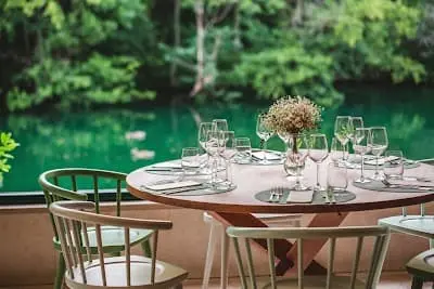 Riverside dining table at Kaštil Slanica